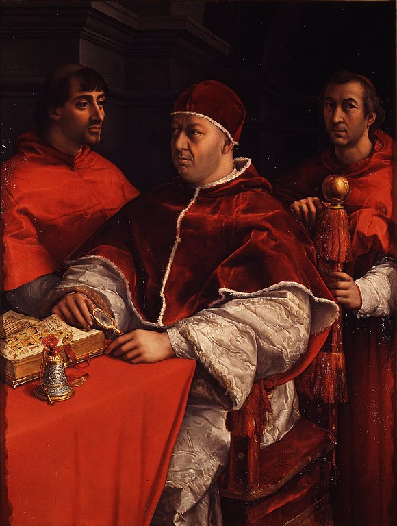 Pope Leo X with Cardinal Giulio to his right.